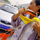 Illustration for article titled Chinese Woman Pulls Six Cars With Her Hair